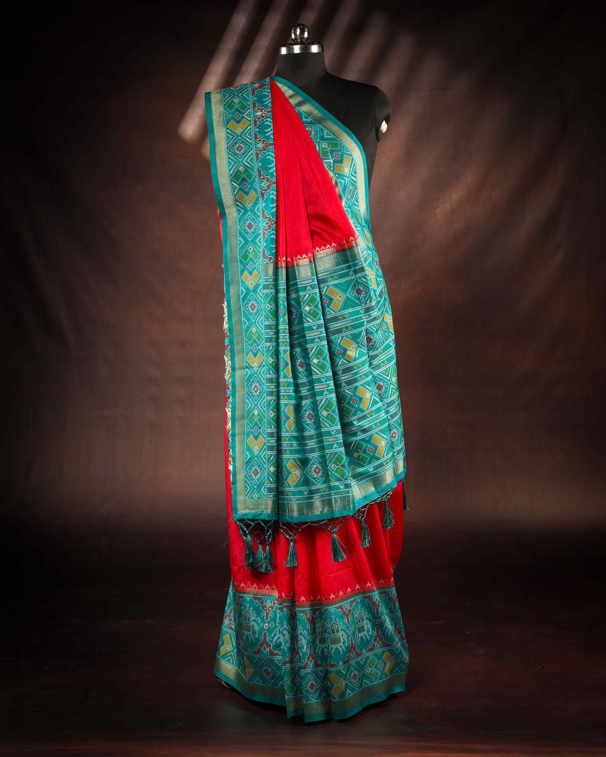 teal blue & rich red patola silk saree with elephant motif