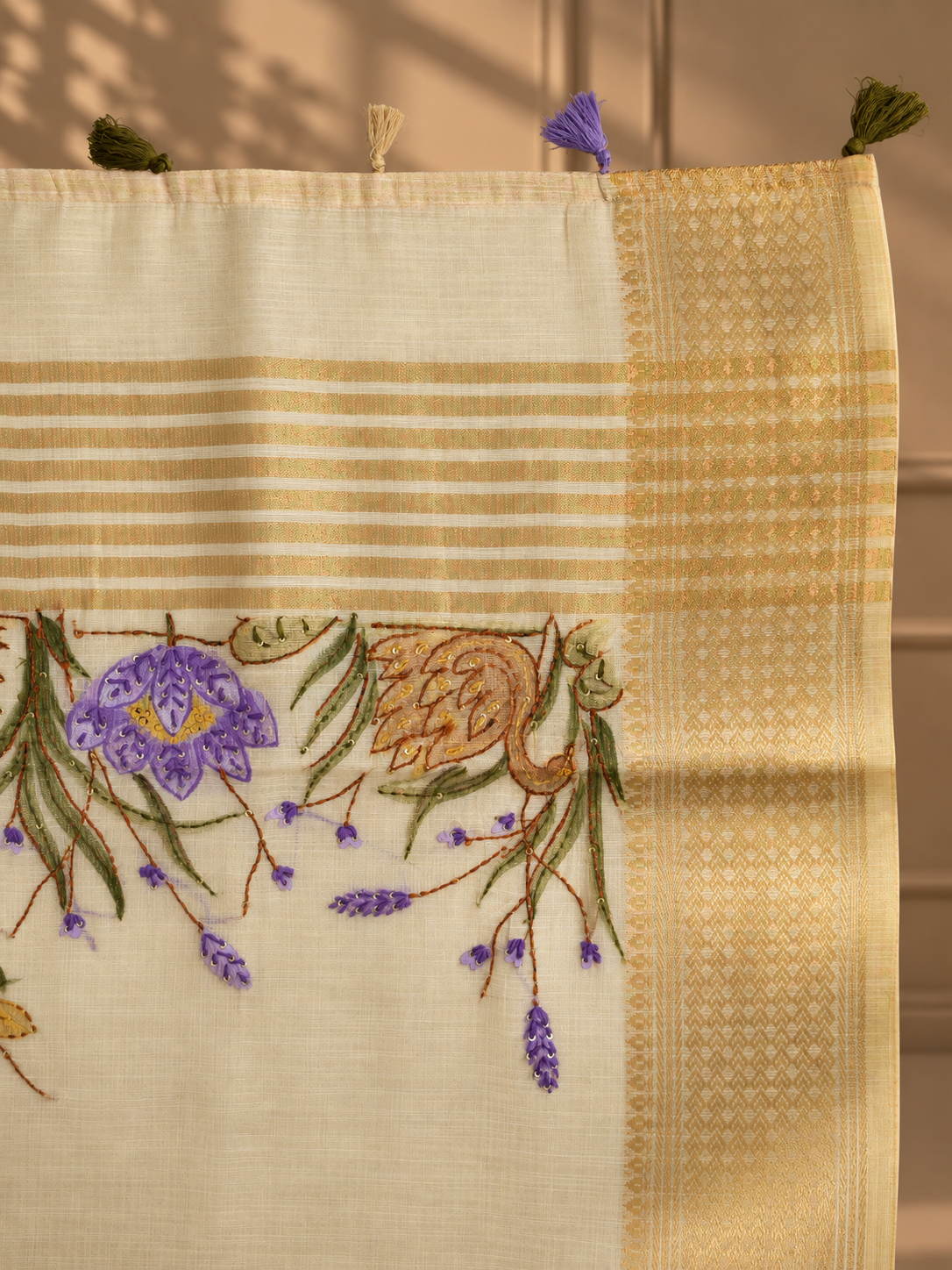 ivory linen saree with hand embroidered purple florals