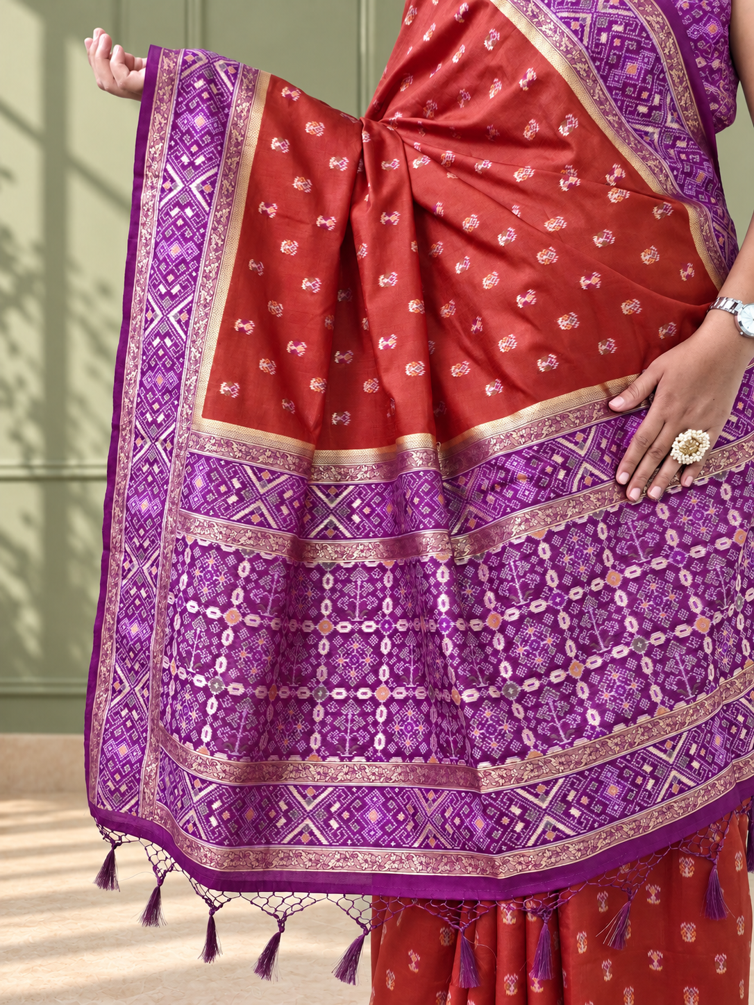 terracotta purple silk patola saree with geometric woven border