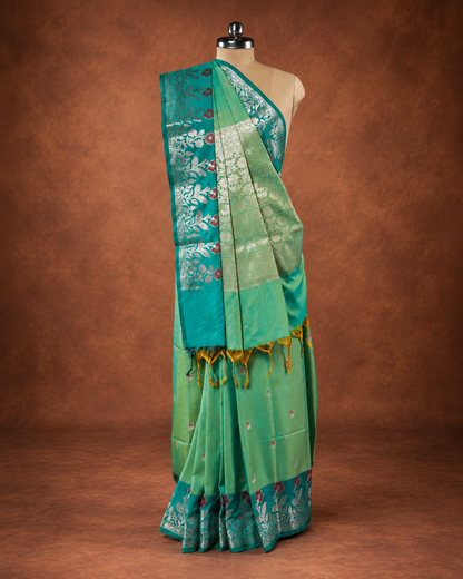 Green A Silk Fancy Open Border Butty Self Saree