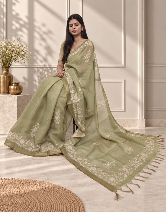 Pistachio Green Linen Saree with Handcrafted Aari Floral Embroidery