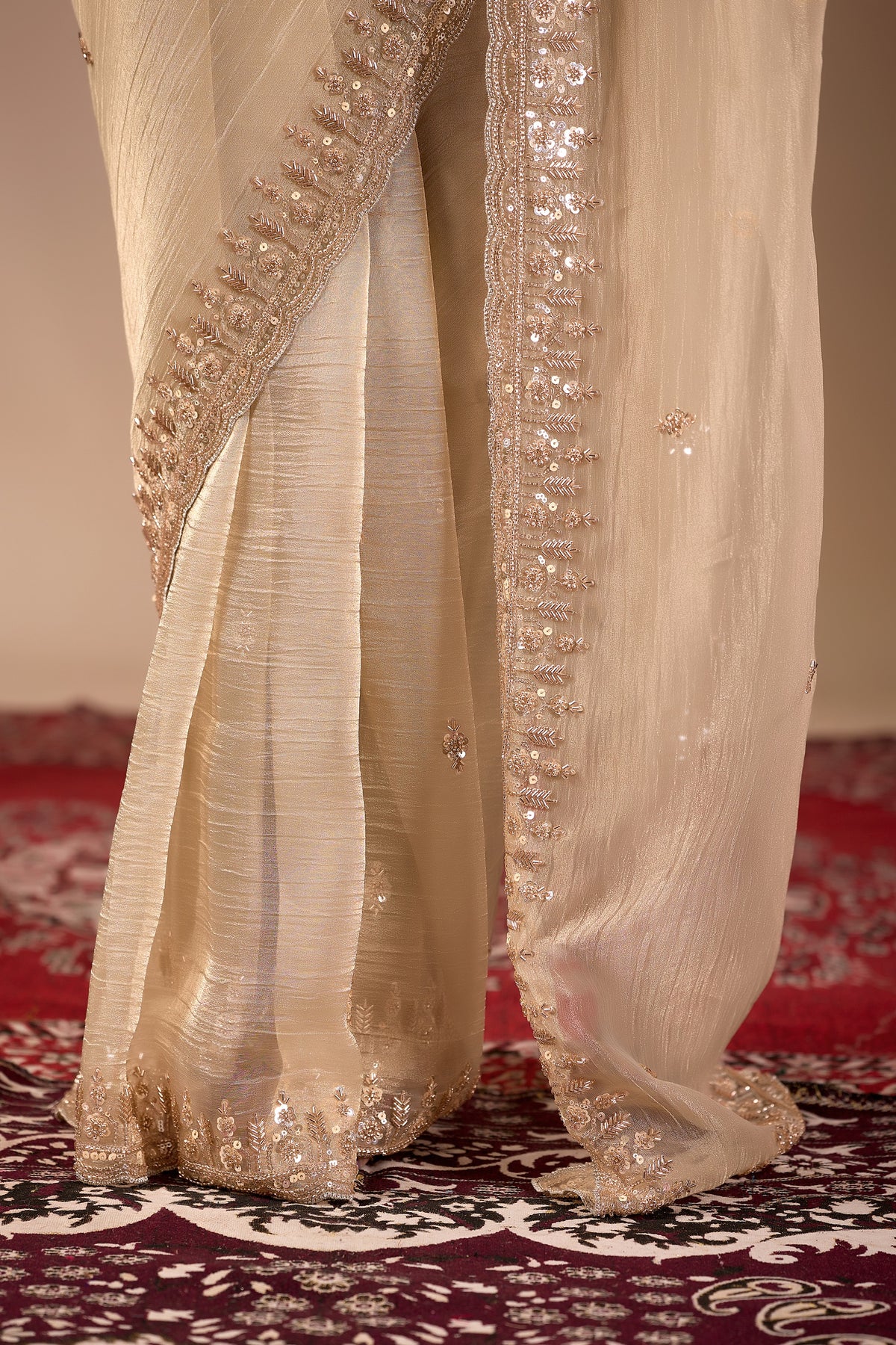 champagne gold soft tissue silk saree with heavy handcrafted beadwork