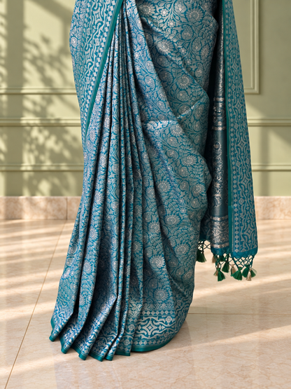 Peacock Blue Crepe Jaal Silk Saree with Matching Floral Border