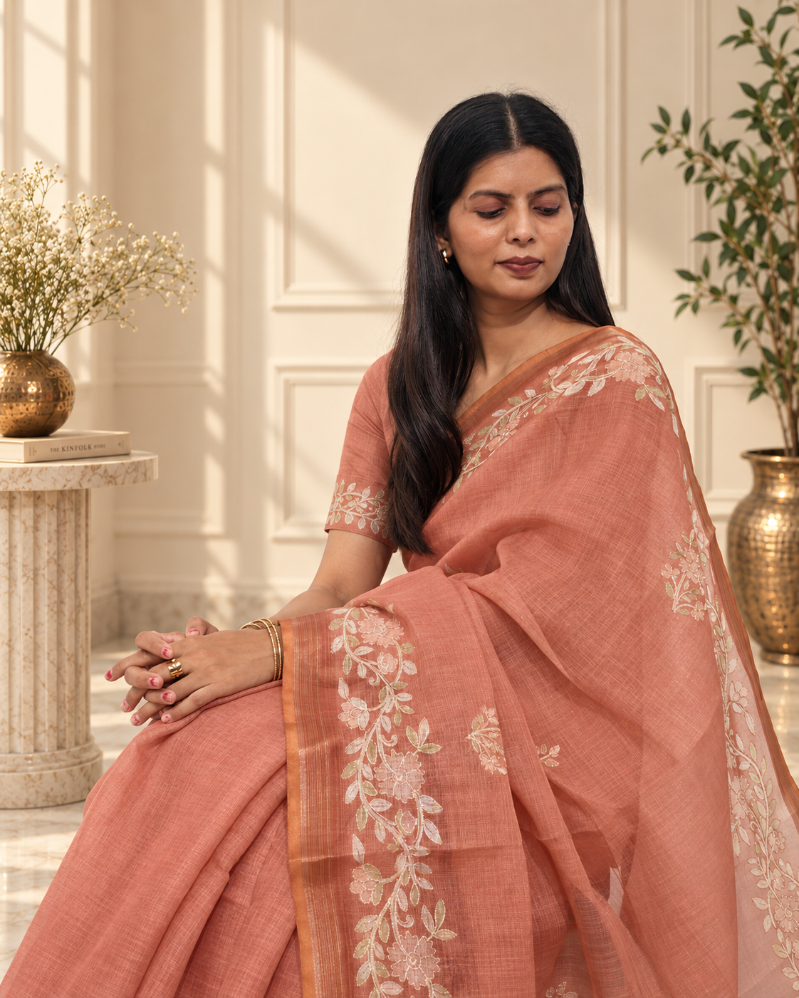 muted terracotta linen saree with handcrafted aari floral embroidery