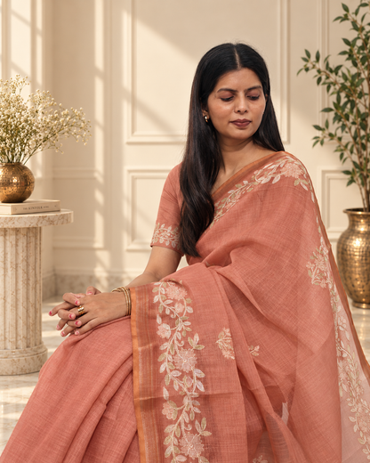 Muted Terracotta Linen Saree with Handcrafted Aari Floral Embroidery