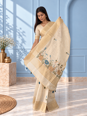 Ivory Linen Saree with Hand Embroidered Peacock Blue Florals