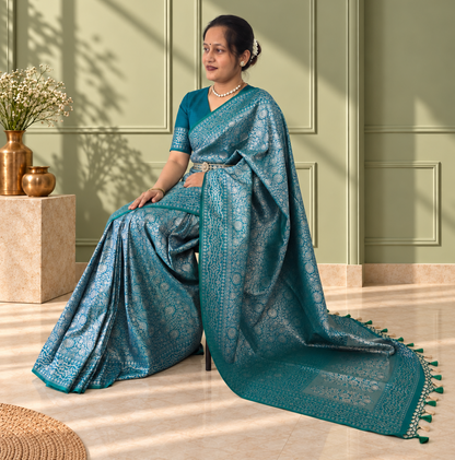 Peacock Blue Crepe Jaal Silk Saree with Matching Floral Border