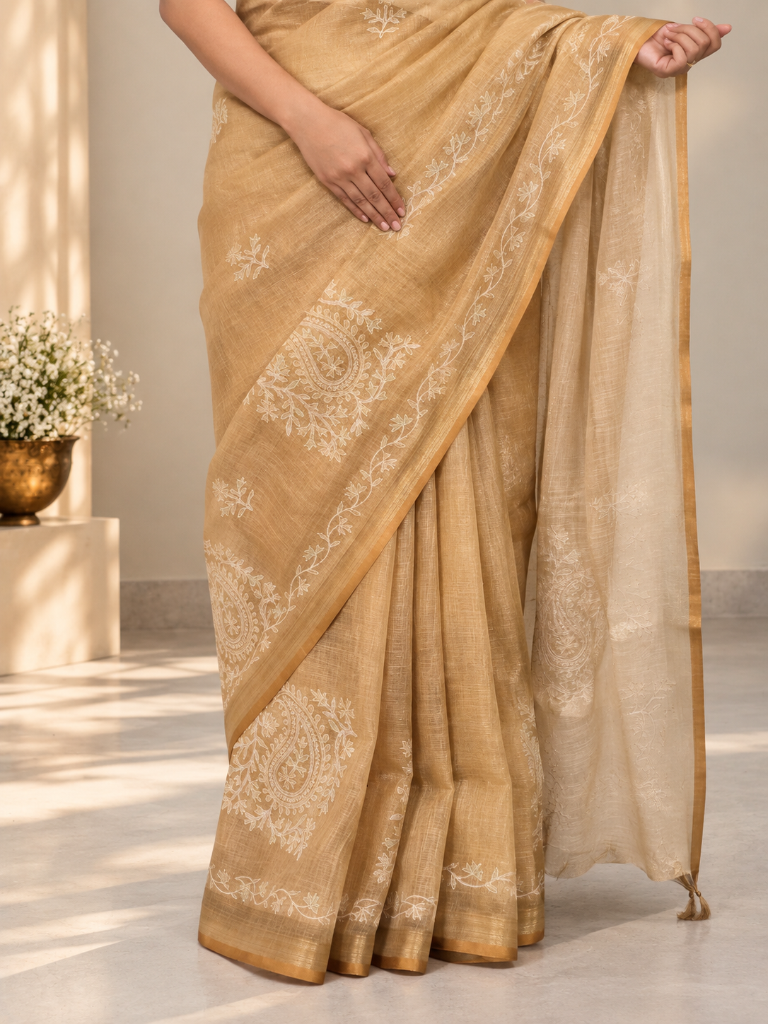 golden tissue linen saree with handcrafted aari patchwork & zari detailing