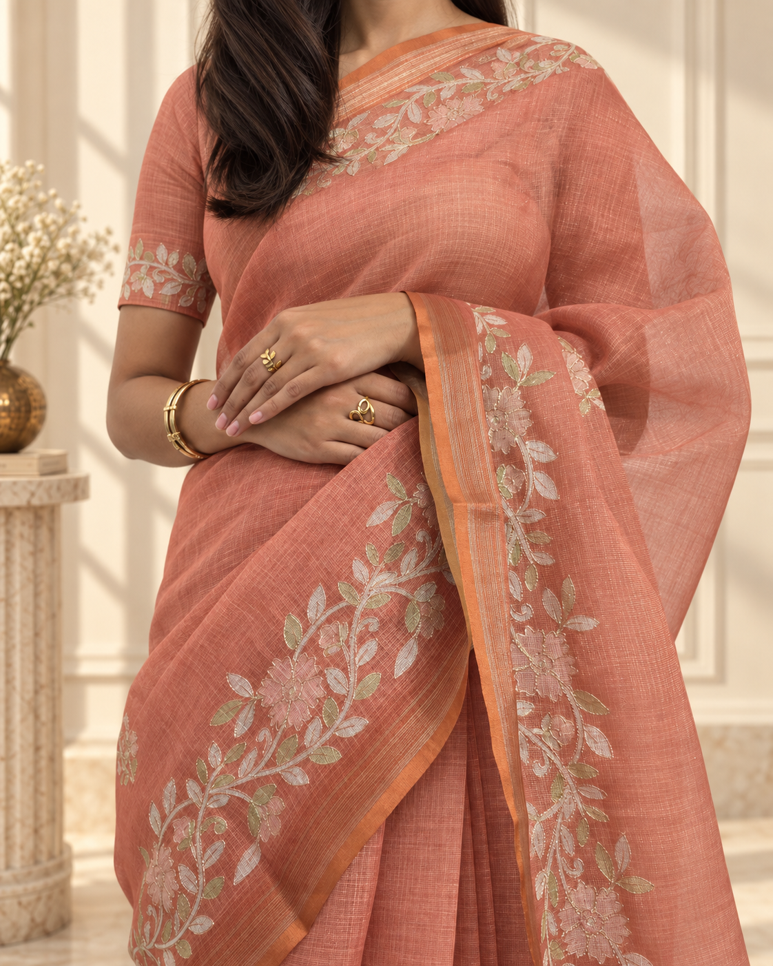 muted terracotta linen saree with handcrafted aari floral embroidery