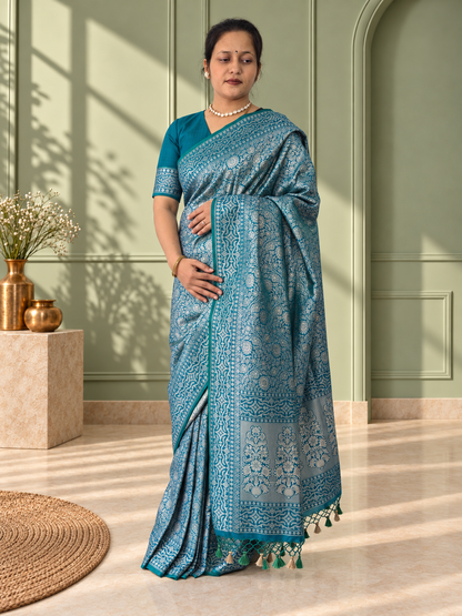Peacock Blue Crepe Jaal Silk Saree with Matching Floral Border