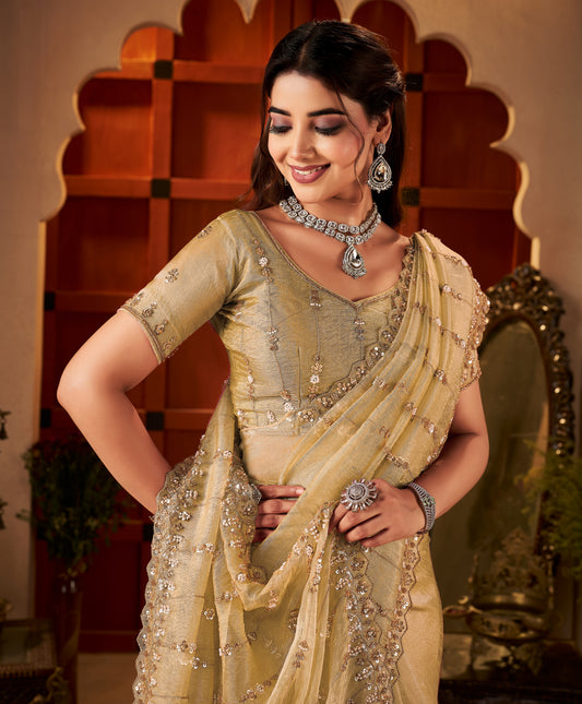 Front half view of Champagne Gold Floral Tissue Silk Saree with hand work