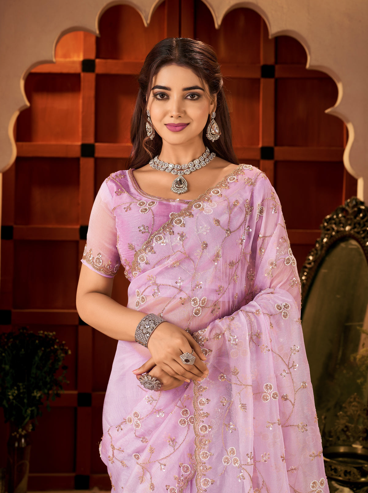 styled look of the chhoga lavender pink tissue silk saree for festive occasions.