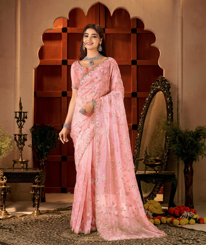 Complete look of the Chhoga Rose Pink Tissue Silk Saree with matching blouse and exquisite hand work.