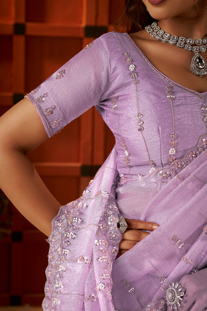 Matching unstitched blouse piece with Chhoga Lavender Pink Tissue Silk Saree