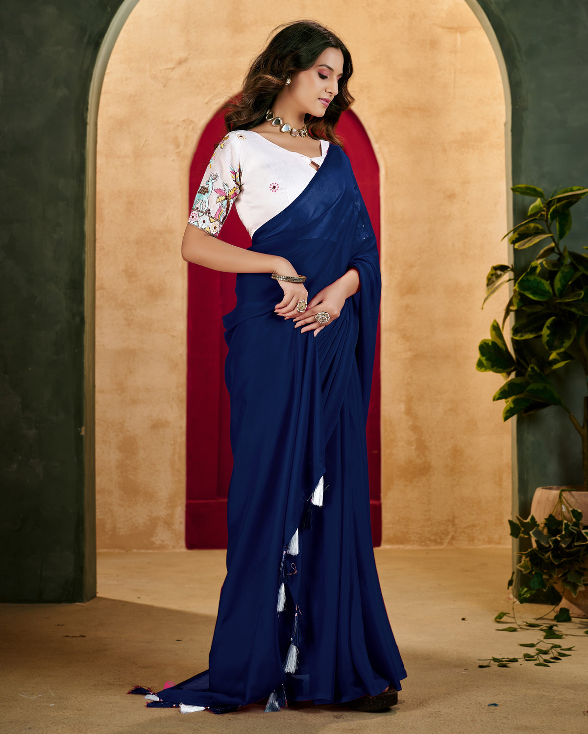 navy blue elegant plain saree with embroidered blouse