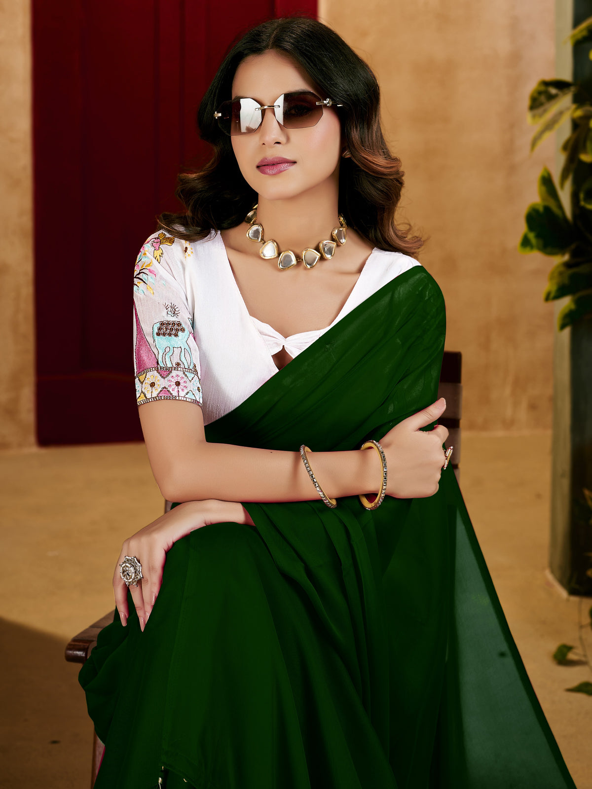 green elegant plain saree with embroidered blouse