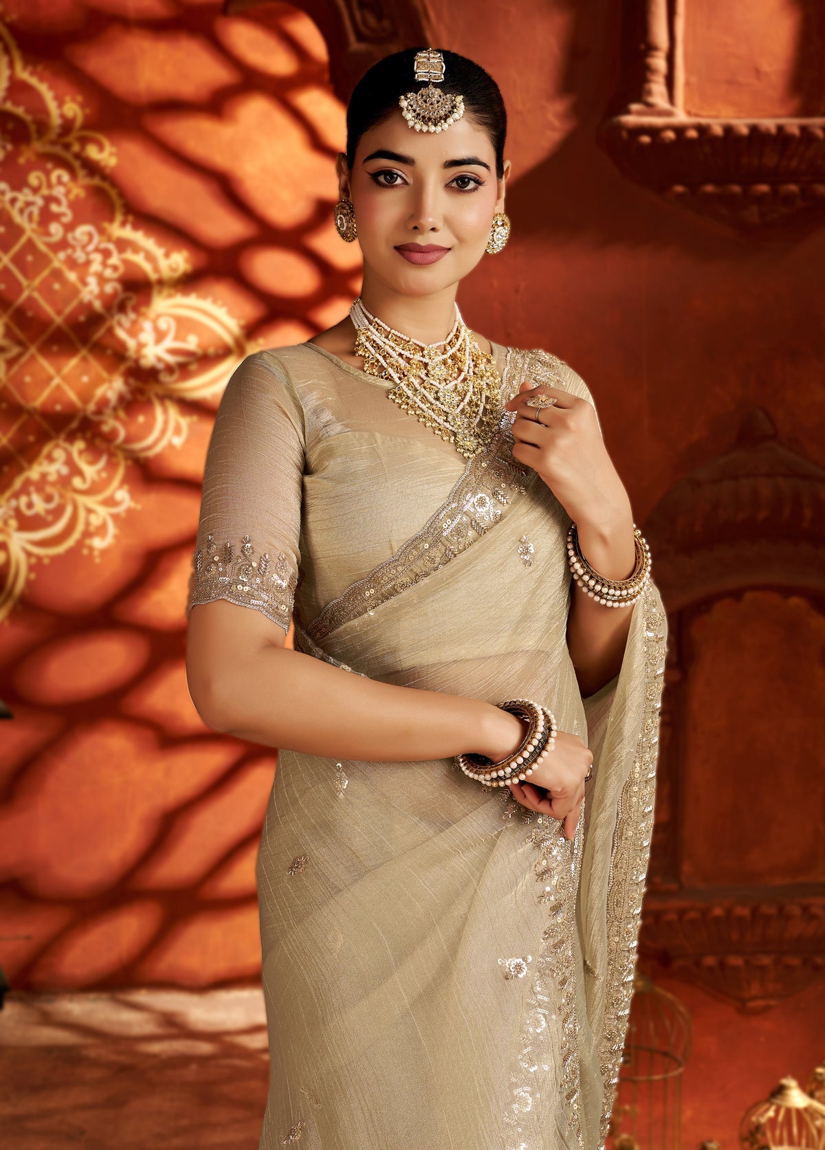 pearl gold soft tissue silk saree with heavy handcrafted beadwork