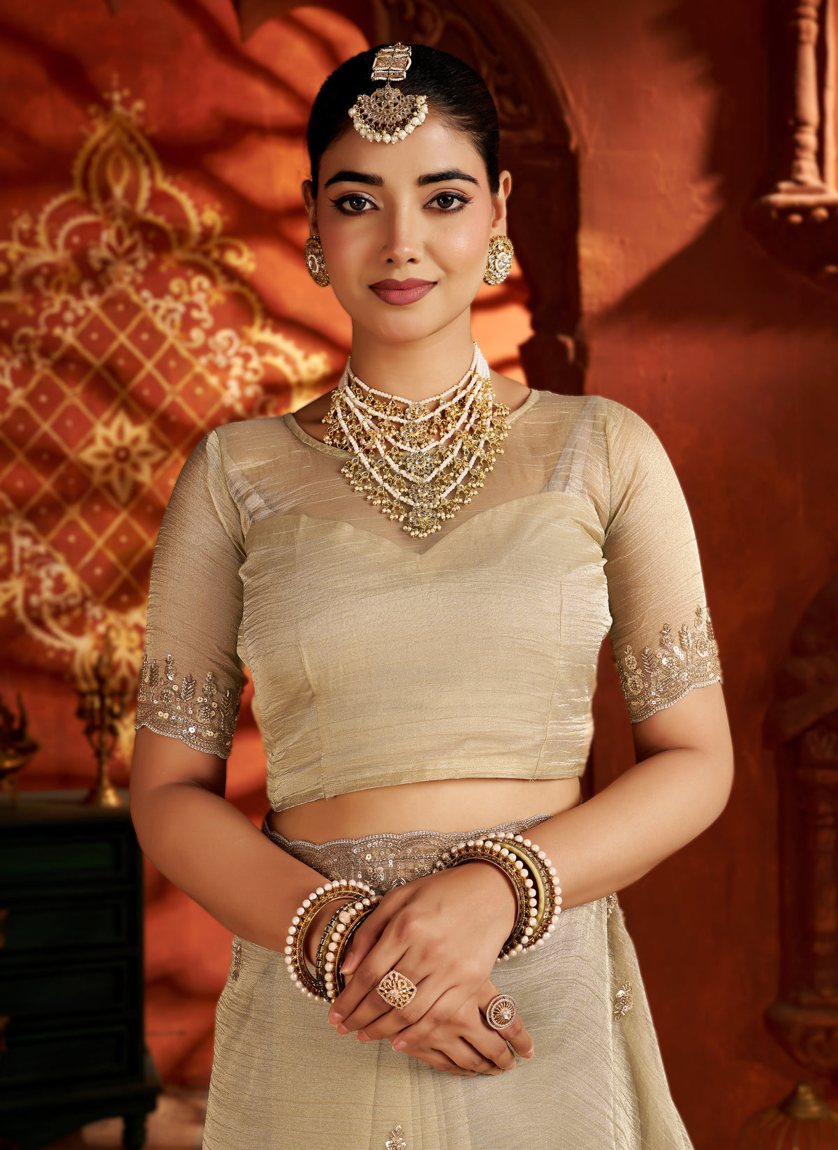 pearl gold soft tissue silk saree with heavy handcrafted beadwork