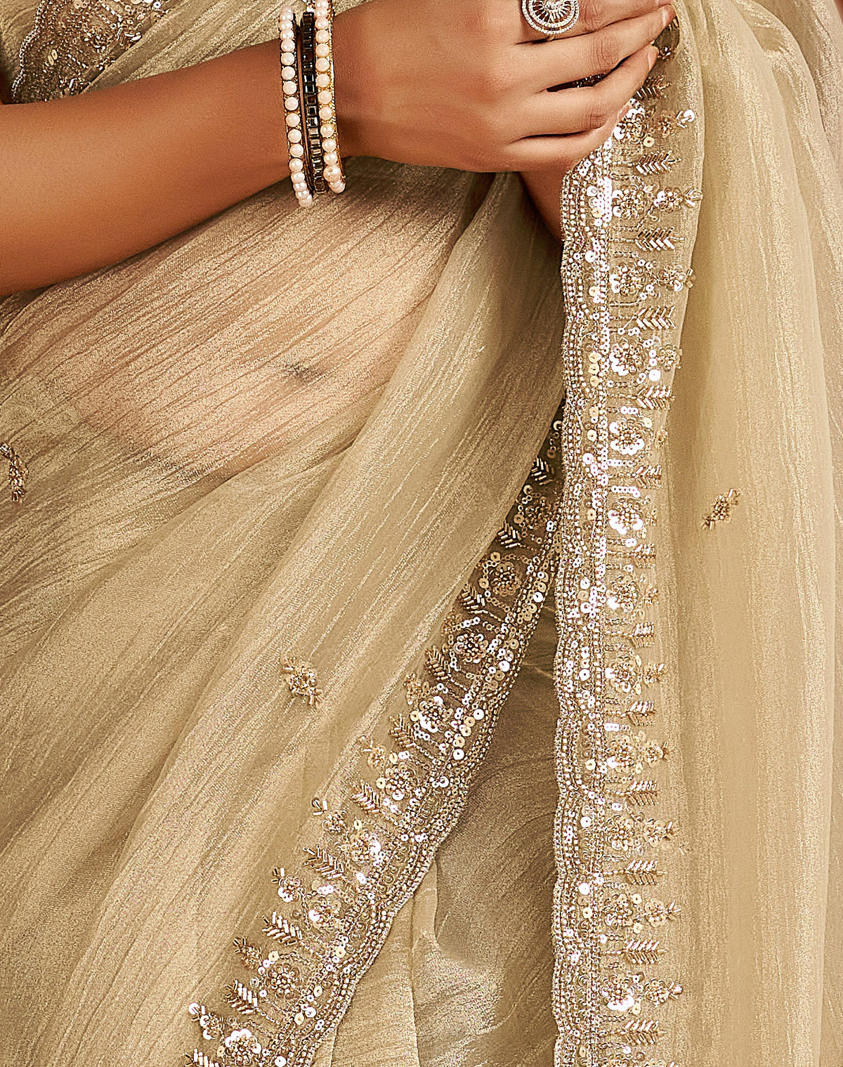 pearl gold soft tissue silk saree with heavy handcrafted beadwork