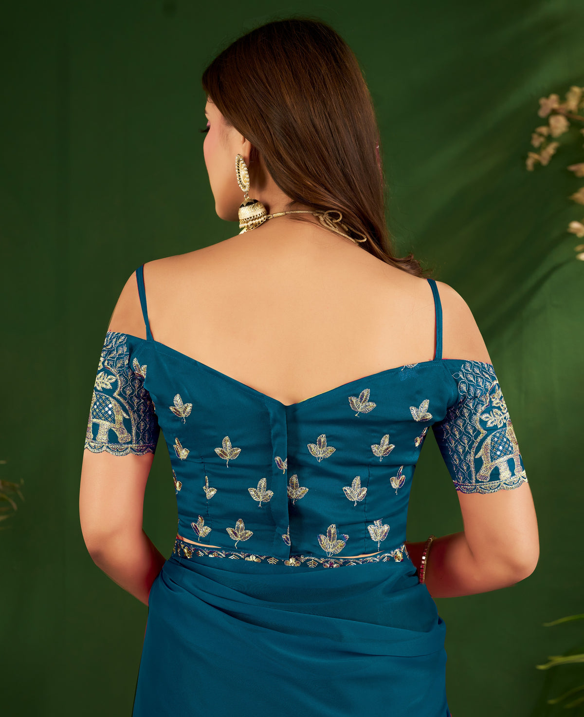 peacock blue rangoli silk saree with embroidered blouse