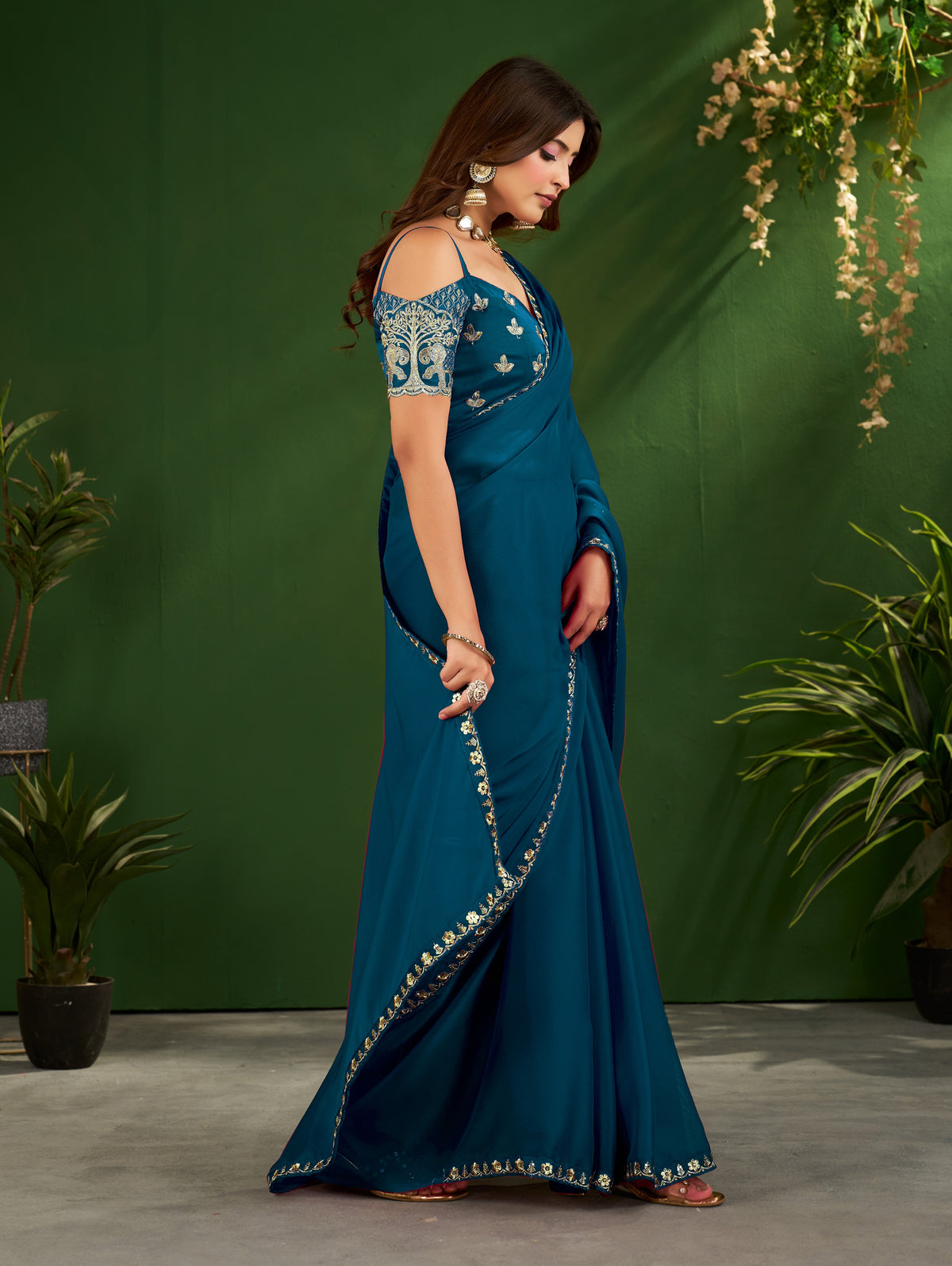 peacock blue rangoli silk saree with embroidered blouse