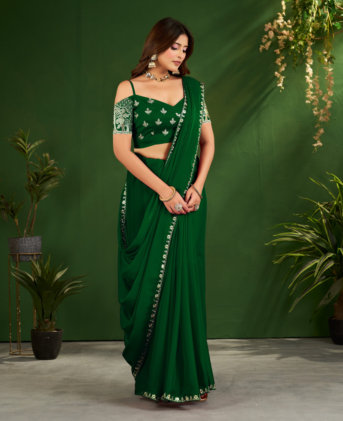 emerald green rangoli silk saree with embroidered blouse