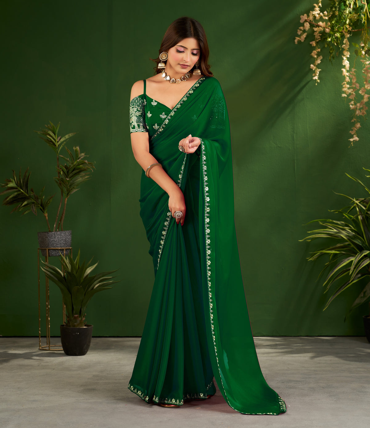 emerald green rangoli silk saree with embroidered blouse