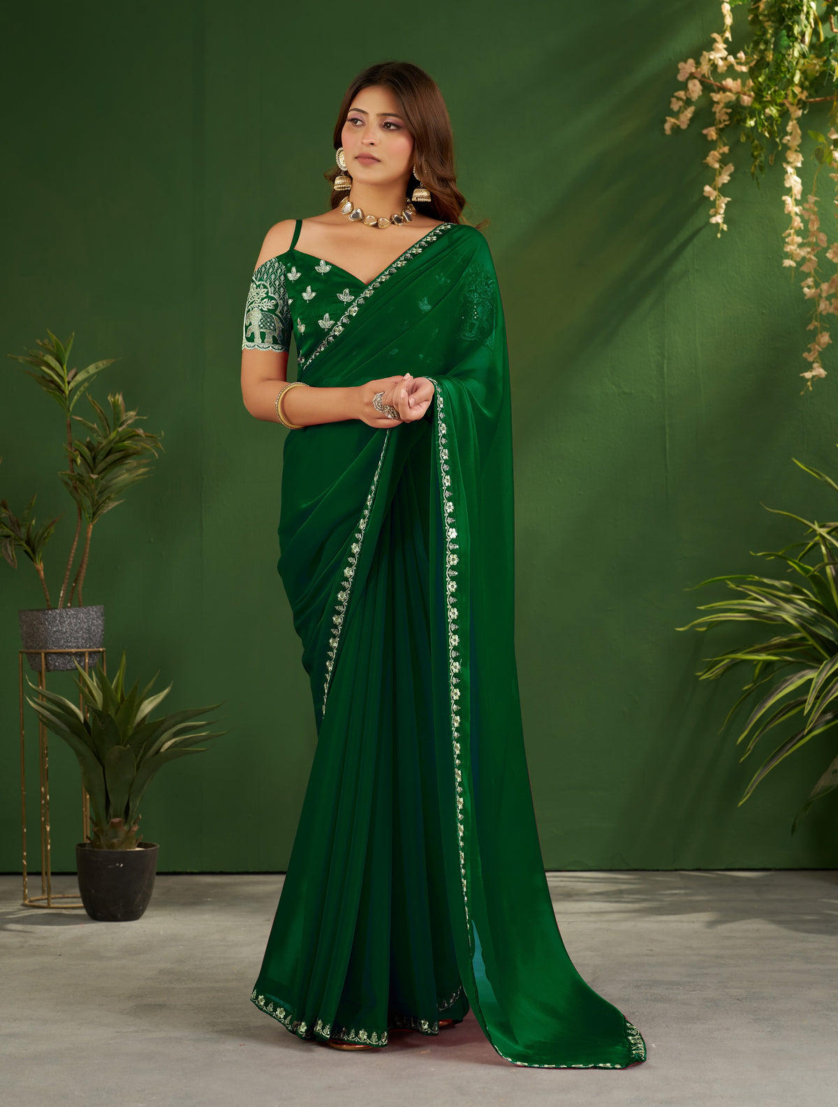 emerald green rangoli silk saree with embroidered blouse