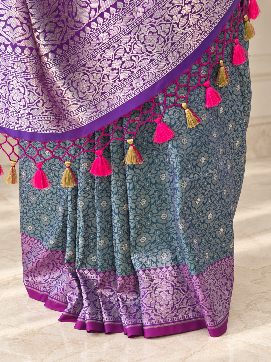 Teal Blue Crepe Jaal Silk Saree with Contrasting Floral Border
