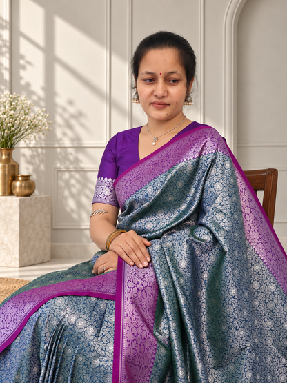 Teal Blue Crepe Jaal Silk Saree with Contrasting Floral Border