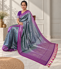 Teal Blue Crepe Jaal Silk Saree with Contrasting Floral Border