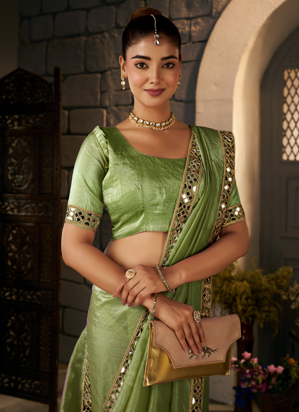 pistachio green crush tissue silk saree with artisan mirror border
