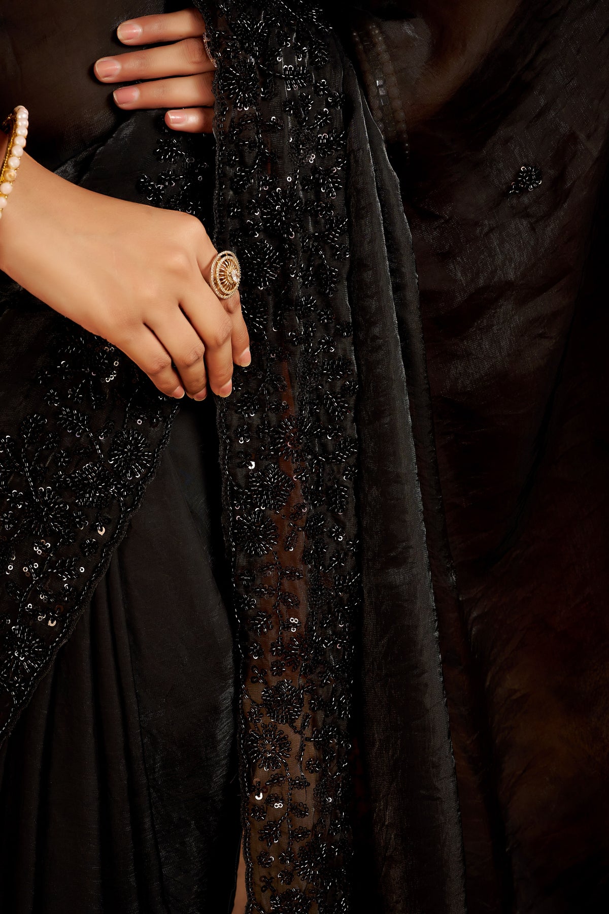black statement saree with heavy handwork border