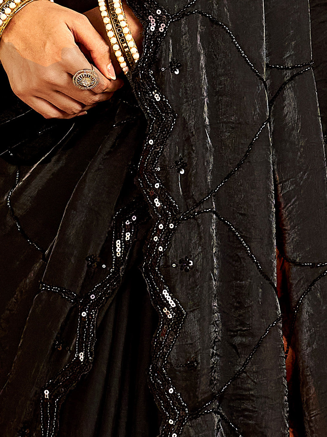 black designer saree with heavy handcrafted work