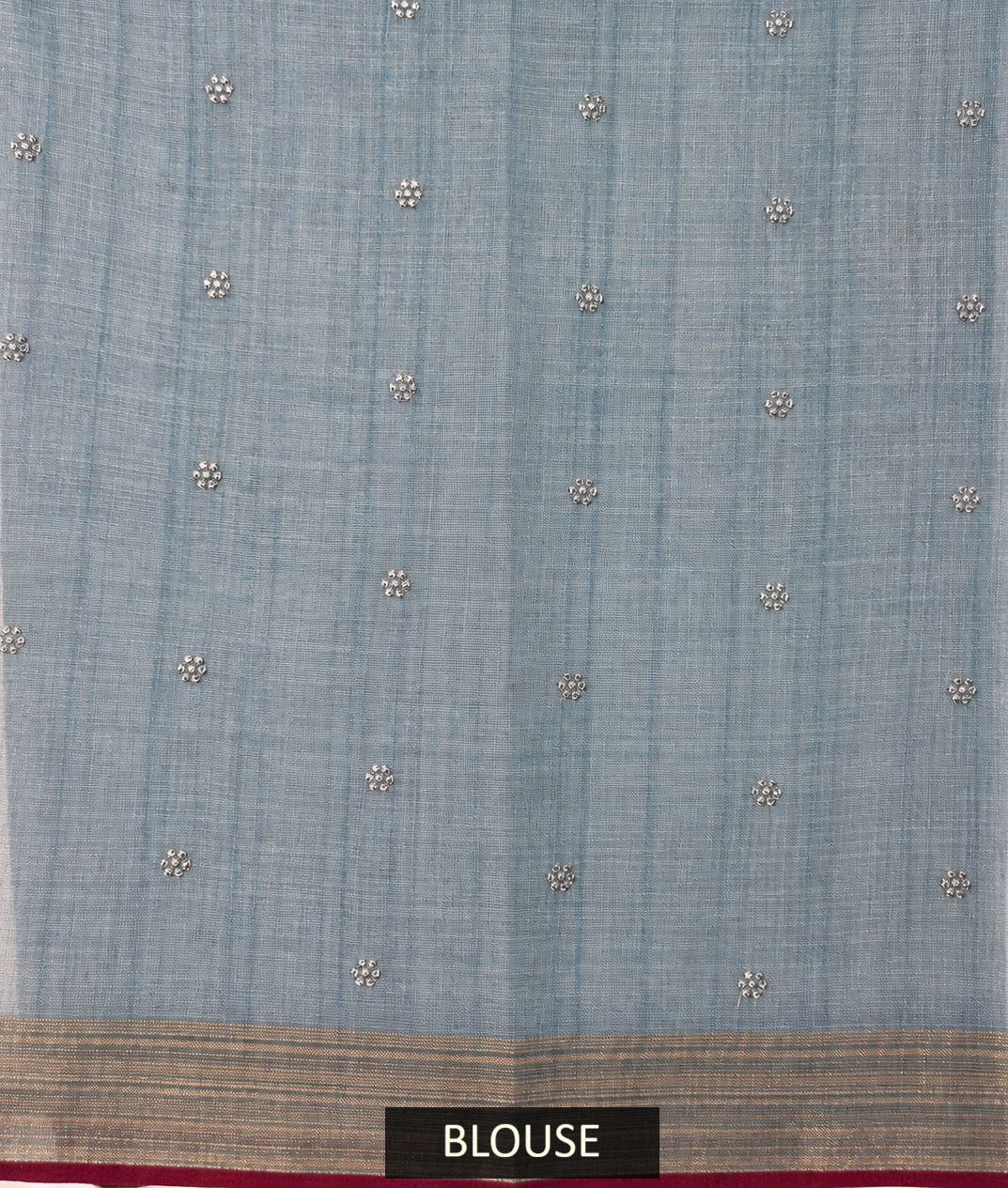 pastel blue linen saree with hand embroidered kantha work