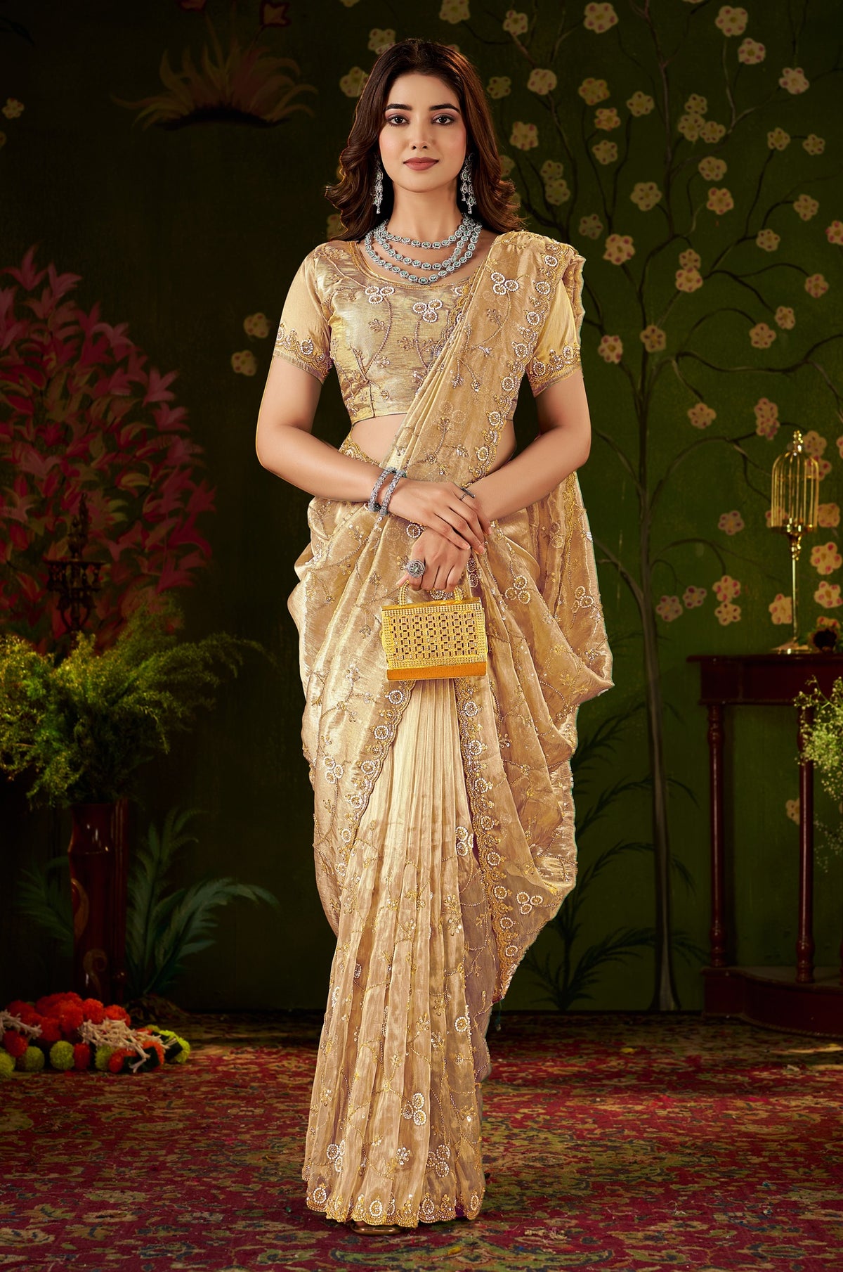Elegant pleats of Chhoga Champagne Gold Floral Vine Tissue Silk Saree