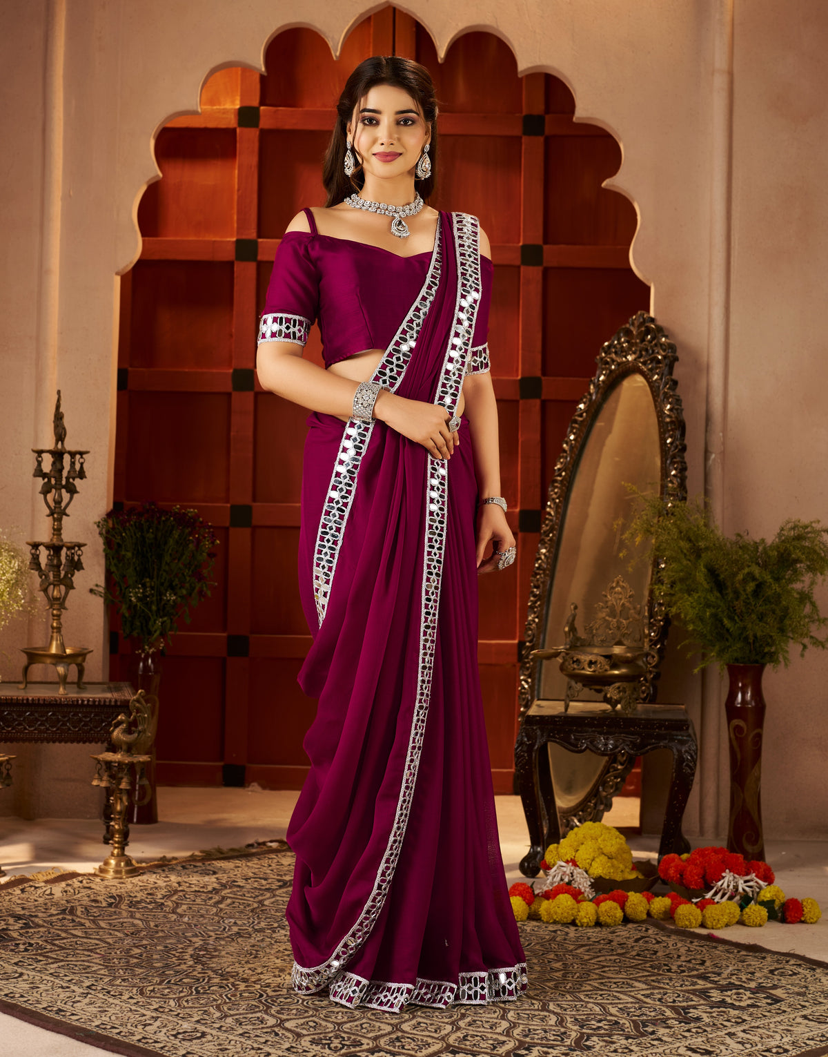 pleats view of chiffon silk deep magenta saree with mirror embellished border