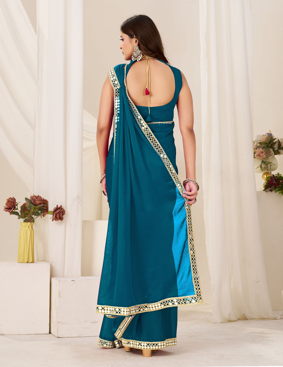 Back view of Chiffon Silk Peacock Blue Saree with Gold Mirror Border