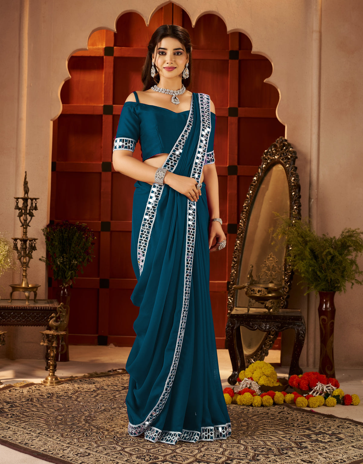 Chiffon Silk Peacock Blue Saree with Mirror Embellished Border front view by Chhoga