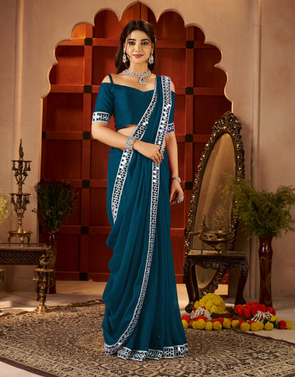 Chiffon Silk Peacock Blue Saree with Mirror Embellished Border front view by Chhoga