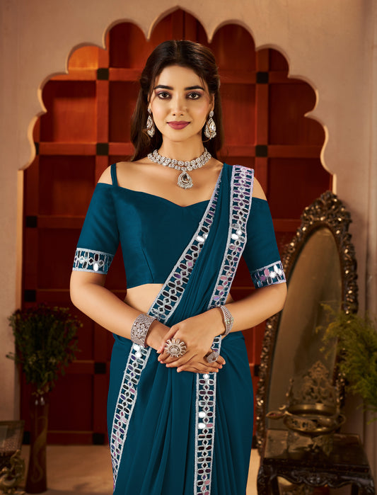 Half view of Chiffon Silk Peacock Blue Saree with Mirror Embellished Border