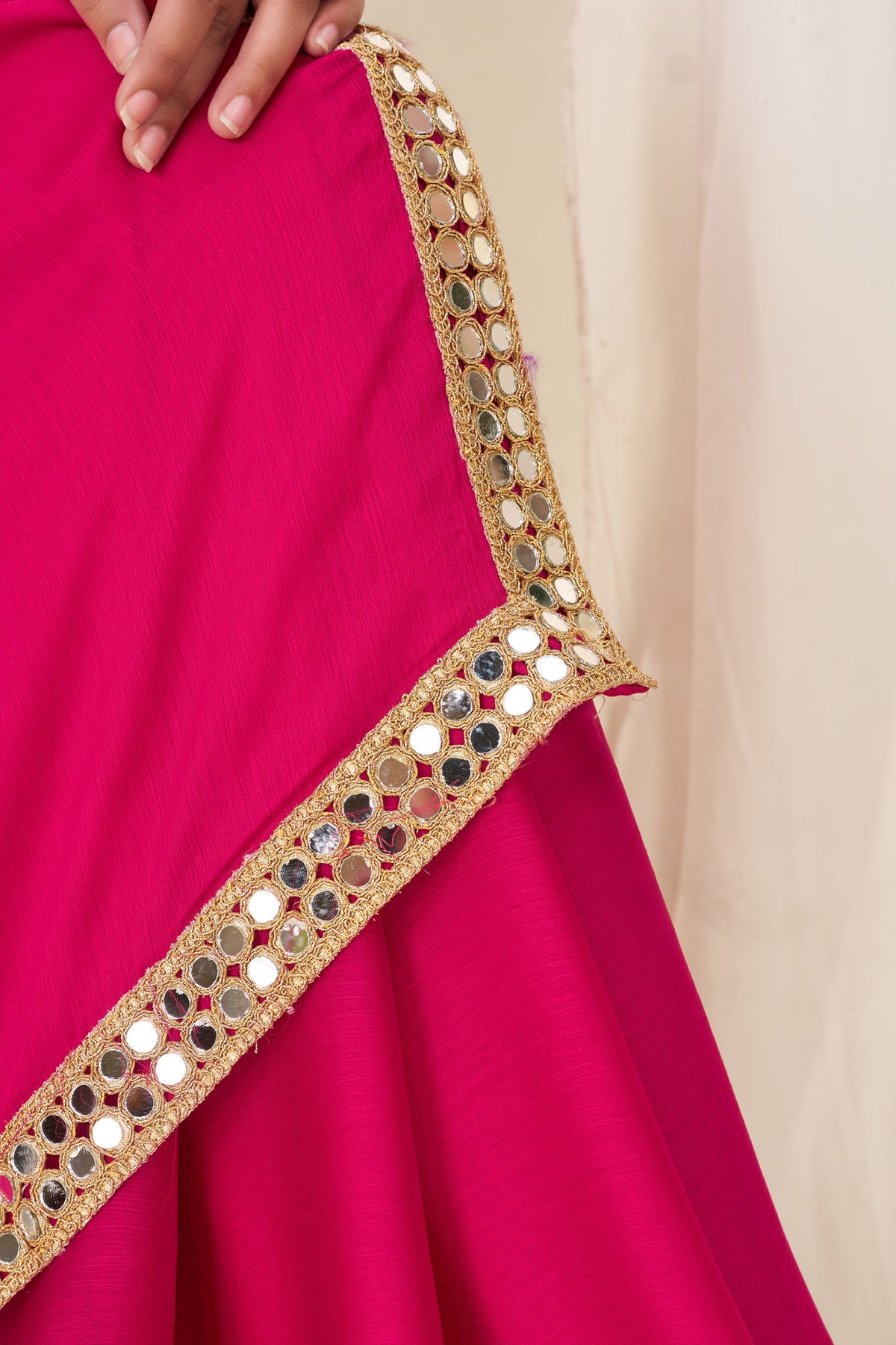 Close-up of gold mirror work on Chiffon Silk Pink Saree