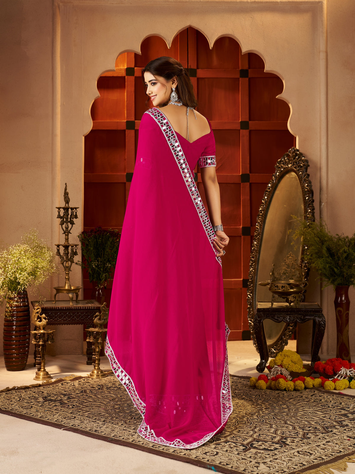 Pallu detail of Chiffon Silk Pink Saree with Silver Mirror Embellished Border