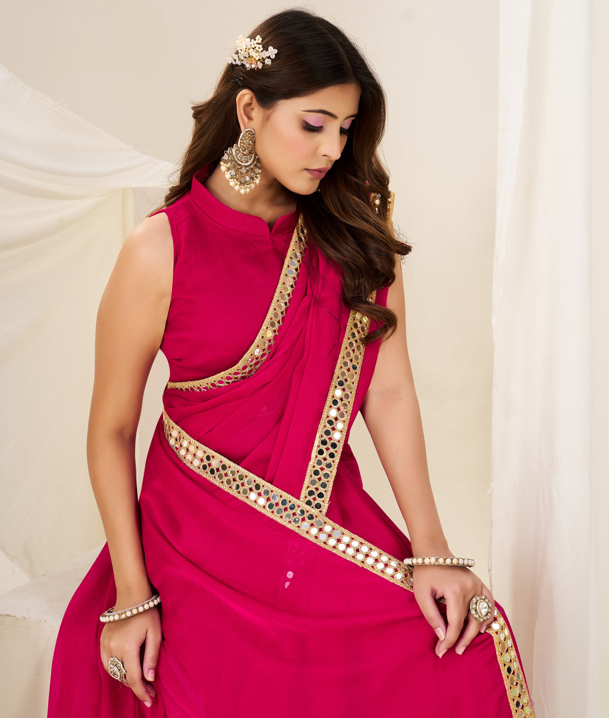 stylish look in chiffon silk pink saree with gold mirror border by chhoga