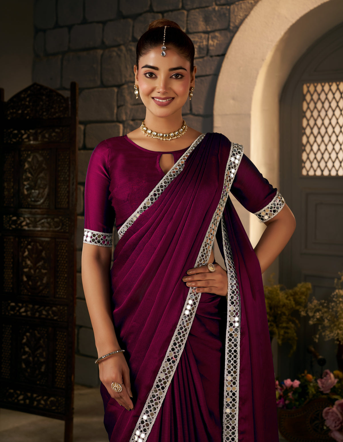 Half view of Deep Magenta Ethnic Saree with Silver Mirror Work