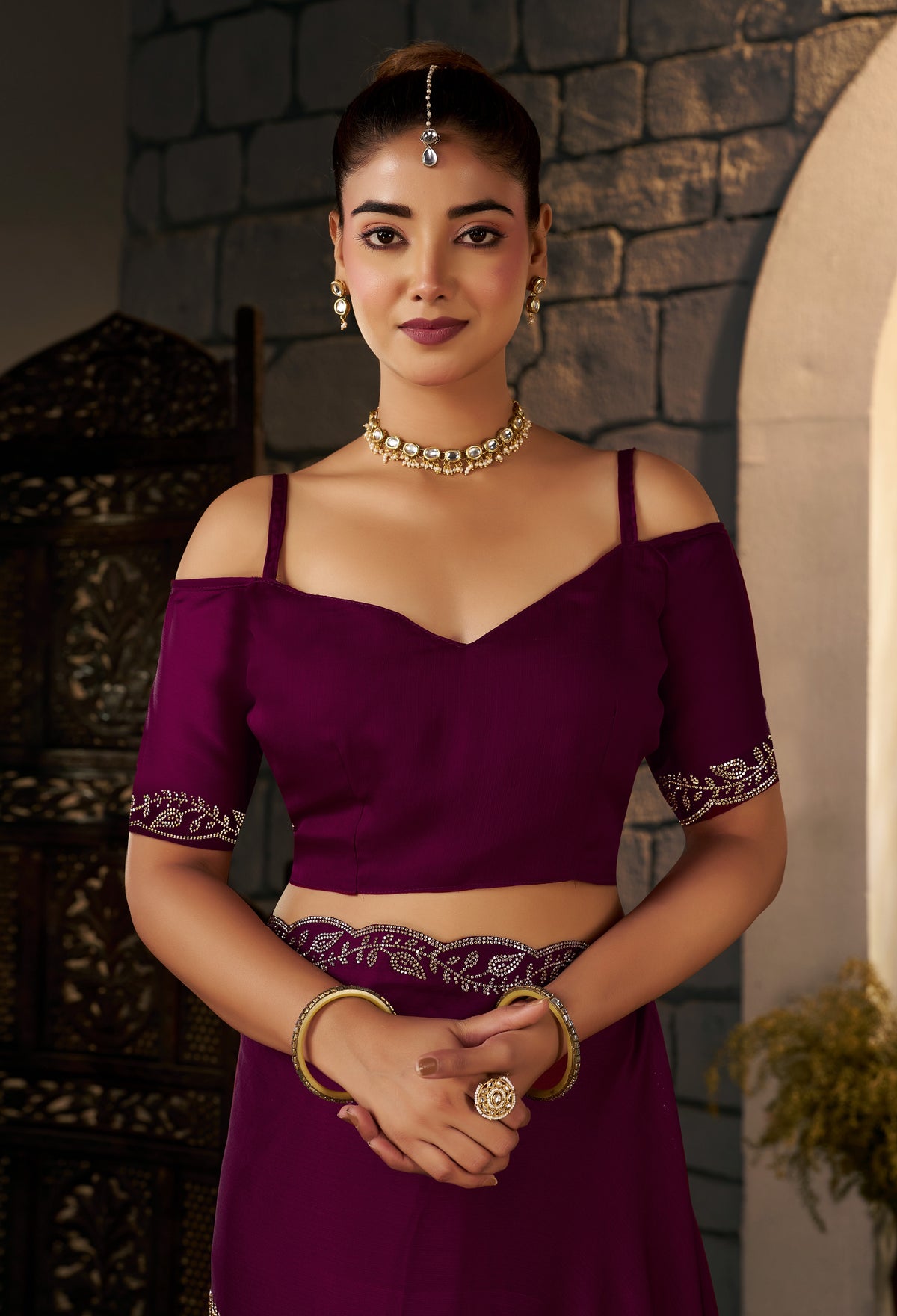 matching unstitched blouse piece for the deep magenta silver stonework designer saree.