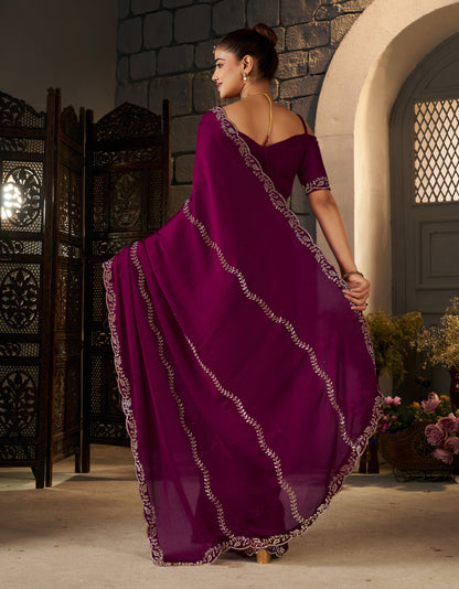 Elegant pallu of the Deep Magenta Silver Stonework Designer Saree with shimmering silver embellishments.