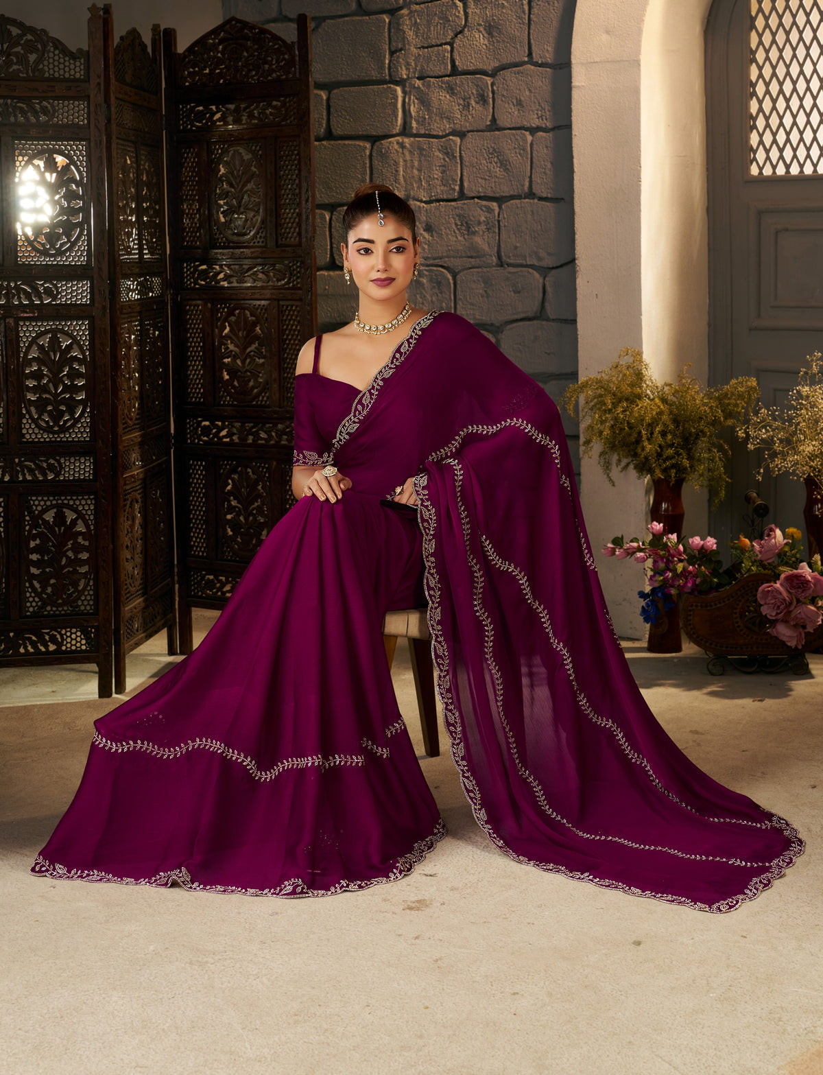 party wear look featuring the deep magenta silver stonework designer saree with matching blouse piece.