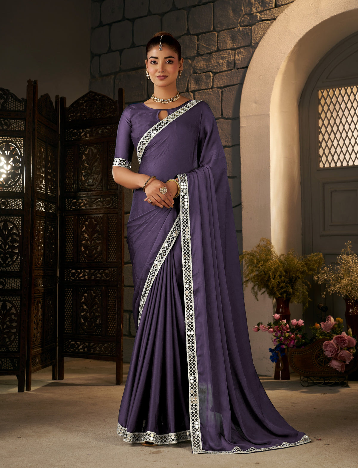 dusty purple ethnic saree with silver mirror work styled for wedding occasions