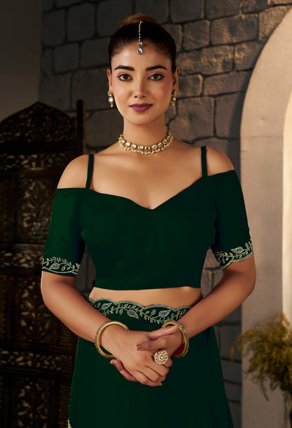 Matching blouse front with gold stonework for the Emerald Green Designer Saree.